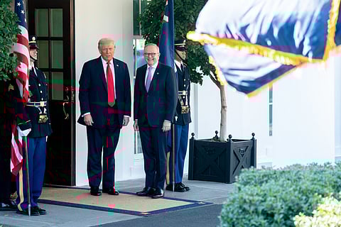 US President Donald Trump, left, and Anthony Albanese, Australia's prime minister, outside the West Wing of the White House in Washington, DC, US, on Monday, Oct. 20, 2025. Albanese will aim to use the meeting to secure an agreement with the US on critical minerals, and will seek assurances on the administration's commitment to the Aukus pact under which the US will help supply Australia with nuclear submarines.