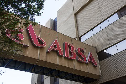 A logo sits on display outside the offices of Absa Bank Ltd.