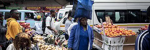 Traders sell their goods in a busy market area in central Johannesburg, South Africa. 