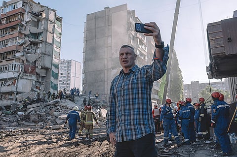 Kyiv Mayor Vitali Klitschko visits the site of a Russian air strike in the city on May 14, 2026
