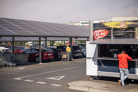 Photovoltaic solar panels cover car parking spaces at a mall in Johannesburg, South Africa, on Aug. 18, 2023. 