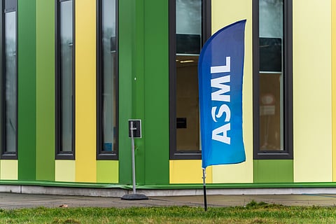 A banner flag with the ASML logo outside the Brainport Industries Campus in Eindhoven, Netherlands.
