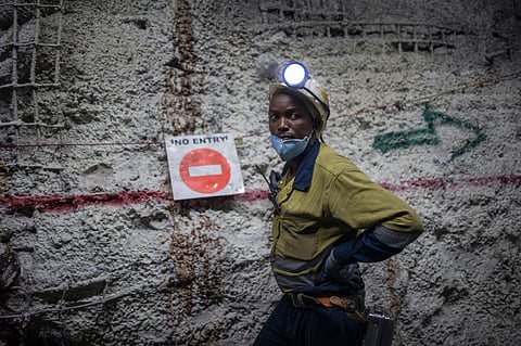 A worker underground at the Gold Fields Ltd. South Deep gold mine in Westonaria, South Africa