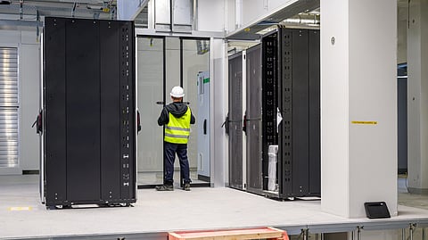 18 August 2026, Brandenburg, Lübbenau: The first server cabinets are now in place inside the shell of the Schwarz Group's data center. On the same day, a media tour took place in Lusatia. The data center construction site was also on the itinerary. The Schwarz Group, parent company of Lidl and Kaufland, is investing approximately 11 billion euros in a new data center here on the outskirts of the Spreewald. The cornerstone was laid in November 2025. Two and a half billion are being invested in construction, with the remainder going toward IT infrastructure; there is no government funding. (Photo by Patrick Pleul/picture alliance via Getty Images)