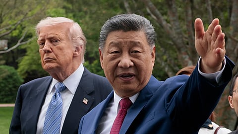 BEIJING, CHINA - MAY 15: U.S. President Donald Trump and Chinese President Xi Jinping tour Zhongnanhai Garden on May 15, 2026 in Beijing, China. Trump and other U.S. officials are finishing up a visit intended to address the Iran conflict, trade imbalances, and the Taiwan situation while establishing new bilateral boards for economic and AI oversight. (Photo by Evan Vucci-Pool/Getty Images)