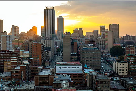 JOHANNESBURG, SOUTH AFRICA - NOVEMBER 5: A general view of Johannesburg as the sun sets on November 5, 2025 in central Johannesburg, South Africa. Johannesburg, historically known as the City of Gold, is facing challenges including aging infrastructure and administrative inefficiencies. The city center has a significant population of African migrants, some of whom are undocumented. Despite these complexities, Johannesburg is preparing to host the G20 Leaders’ Summit on 22–23 November 2025, which will bring together heads of state and government from around the world. (Photo by Per-Anders Pettersson/Getty Images)