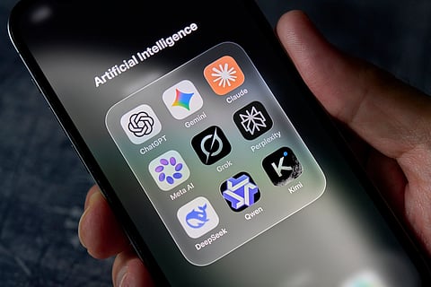 The ChatGPT, Gemini, Claude, Meta AI, Grok, Perplexity, DeepSeek, Qwen and Kimi artificial intelligence app icons are seen grouped in an Artificial Intelligence folder on an iPhone screen held in a hand, in this illustration photo taken on August 19, 2026. (Photo by Matteo Della Torre/NurPhoto via Getty Images)