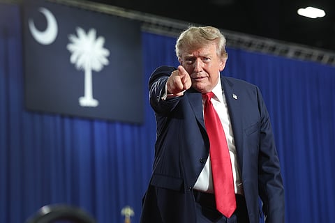 MYRTLE BEACH, SOUTH CAROLINA - AUGUST 21: U.S. President Donald Trump leaves the stage after speaking at a campaign rally with U.S. Sen. Darline Graham (R-SC) on August 21, 2026 in Myrtle Beach, South Carolina. President Trump traveled to South Carolina to join Republican Senate candidate Darline Graham for a campaign rally ahead of Tuesday's runoff election against Ralph Norman. (Photo by Win McNamee/Getty Images)