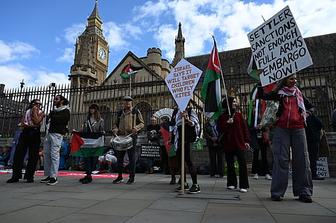 LONDON, UNITED KINGDOM - SEPTEMBER 9: Pro-Palestinian demonstrators gather in Parliament Square in London, United Kingdom, on September 9, 2026. Demonstrators waved Palestinian flags and held banners urging the UK government to impose immediate diplomatic and economic sanctions on Israel, cut arms exports, and terminate bilateral military cooperation agreements. (Photo by Rasid Necati Aslim/Anadolu via Getty Images)