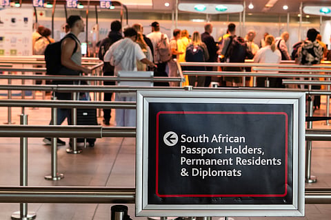 CAPE TOWN, SOUTH AFRICA – AUGUST 18: South Africa Passport Holders sign at the launch of a visionary partnership between Border Management Authority, the Western Cape Government and the Cape Town Metro at the Cape Town International Airport on August 18, 2025 in Cape Town, South Africa. The partnership will help strengthen immigration capacity at the airport to enhance national security, while aiding tourism growth and job creation in the metro and province. (Photo by Gallo Images/Die Burger/Jaco Marais)