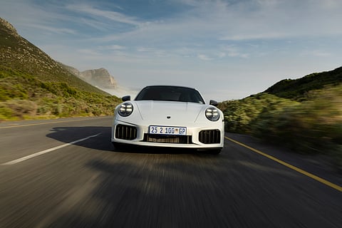 Porsche 911 Turbo S: A business-class seat with a rocket strapped to it
