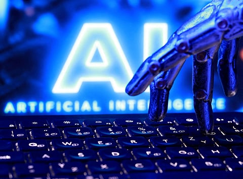 FILE PHOTO: "AI Artificial Intelligence" words, a keyboard and a robotics hand in this illustration taken, September 23, 2026. REUTERS/Dado Ruvic/Illustration/File Photo