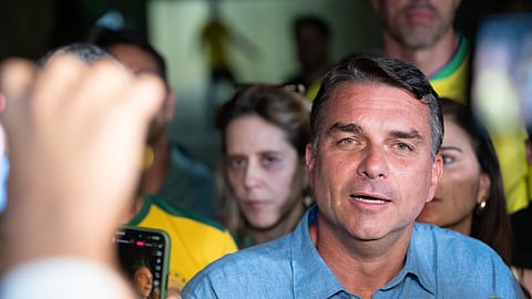 BRASILIA, BRAZIL - OCTOBER 4: Presidential candidate Flavio Bolsonaro for the Partido Liberal speaks to the press after the votes are tallied during the general election day on October 4, 2026 in Brasilia, Brazil. According to official results, Bolsonaro has 47.06% of the votes, and incumbent president of Brazil and presidential candidate Luiz Inácio Lula Da Silva has 45.13% with 99% of the voting counted. Bolsonaro and Lula will face off in a runoff on October 25, 2026 after neither reached 50% of the votes to be elected president. In this general election, citizens will also vote for governors in 26 states, to renew the Chamber of Deputies and to elect a third of the Senate. (Photo by Ton Molina/Getty Images)