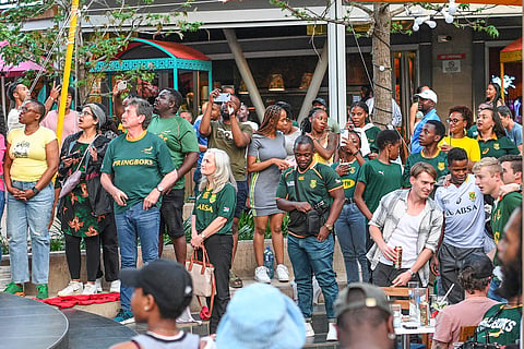 PRETORIA, SOUTH AFRICA - SEPTEMBER 10: South African fans watch the Rugby World Cup match between South Africa and Scotland at Loftus Park on September 10, 2023 in Pretoria, South Africa. (Photo by Lefty Shivambu/Gallo Images)