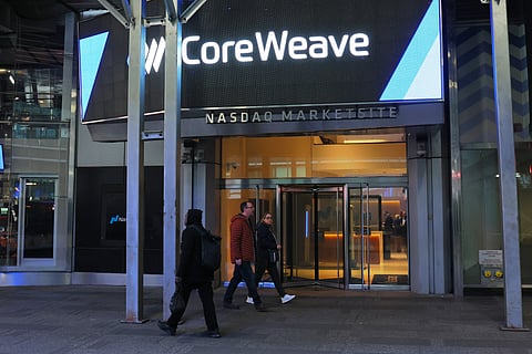 NEW YORK, NEW YORK - MARCH 28: The CoreWeave company name is displayed during the company's Initial Public Offering(IPO) at the Nasdaq headquarters on March 28, 2025 in New York City. Cloud Based Artificial Intelligence Computing Company CoreWeave had its IPO this morning with its shares listed at $40. The company provides access to Nvidia graphics processing units for artificial intelligence training and workloads. (Photo by Michael M. Santiago/Getty Images)