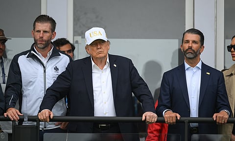 Clare , Ireland - 12 September 2026; U.S. President Donald Trump, Eric Trump, left, and Executive Vice President of the Trump Organisation Donald Trump Jr, right, during day three of the Amgen Irish Open Golf Championship 2026 at Trump International Golf Links in Doonbeg, Clare. (Photo By Brendan Moran/Sportsfile via Getty Images)