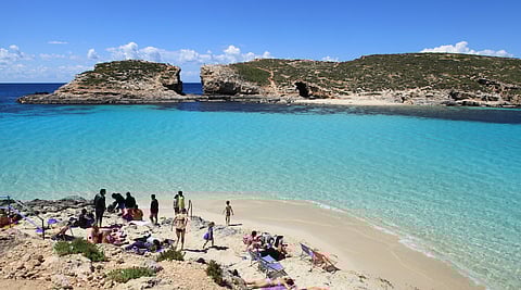  View from Comino to Cominotto and the Blue Lagoon in Għajnsielem, Malta. 