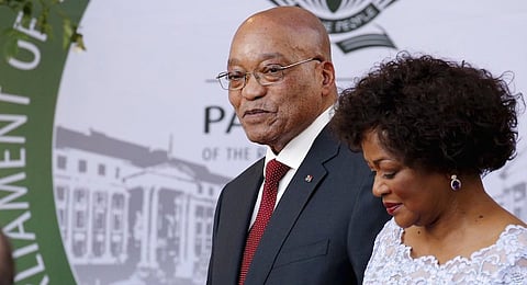 South Africa's President Jacob Zuma arrives with Speaker of Parliament Baleka Mbete to give his State of the Nation address at the opening session of Parliament in Cape Town, February 11, 2016.  REUTERS/Mike Hutchings