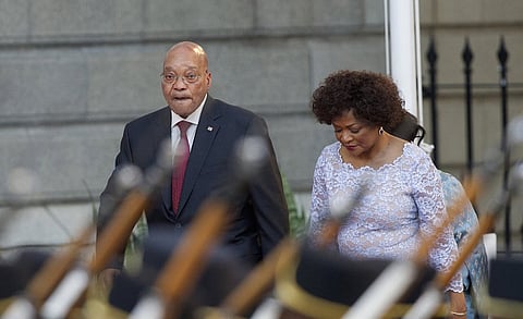 South Africa's President Jacob Zuma arrives with Speaker of Parliament Baleka Mbete to give his State of the Nation address at the opening session of Parliament in Cape Town, February 11, 2016.  REUTERS/Rodger Bosch