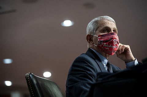 Anthony Fauci, director of the National Institute of Allergy and Infectious Diseases, wears a Washington Nationals protective mask while listening during a Senate Health, Education, Labor and Pensions Committee hearing in Washington, D.C., U.S., on Tuesday, June 30, 2020. The U.S. government's top infectious disease specialist said he's "quite concerned" about the spike in cronavirus cases in Florida, Texas, Arizona and California.