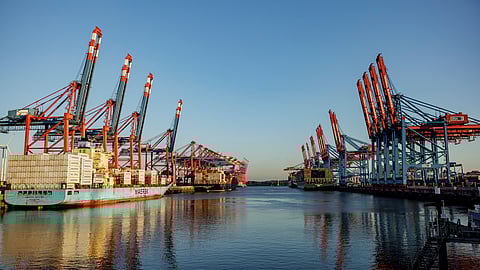 23 June 2022, Hamburg: Container ships are waiting to be handled at the terminals in the Port of Hamburg. The trade union Verdi calls on seaport workers to go on a 24-hour warning strike. Photo: Axel Heimken/dpa (Photo by Axel Heimken/picture alliance via Getty Images)