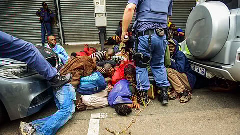 Protesters and police clash during the Foreign March where South Africans from different areas protested against illegal immigrants on February 24, 2017 in Pretoria, South Africa. Police fired rubber bullets and stun grenades to control the situation. (Photo by Gallo Images / Alet Pretorius)