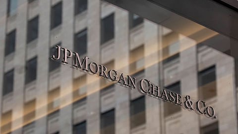 JPMorgan Chase & Co. signage outside the headquarters in New York, U.S., on Thursday, July 22, 2021. After a year of Zoom meetings and awkward virtual happy hours, New York's youngest aspiring financiers have returned to the offices of the city's investment banks, where they're making the most of the in-person mentoring and networking they've lacked during the pandemic.