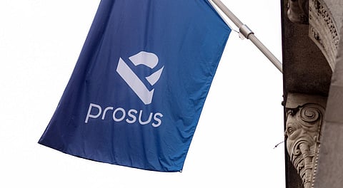A Prosus flag is displayed ahead of the trading debut of the new Prosus NV unit of Naspers Ltd., outside the Amsterdam Stock Exchange, operated by Euronext NV, in Amsterdam, Netherlands, on Wednesday, Sept. 11, 2019. Naspers will retain 73% of the new company, which will house everything from a 31% stake in Chinese online giant Tencent to food delivery and advertising firms from the U.S. to India and Brazil.