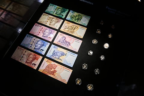 Upgraded South African rand banknotes and coins, featuring Former President Nelson Mandela, and Africas so-called Big Five wild animals  rhino, elephant, lion, buffalo and leopard, on display during their launch event in Johannesburg, South Africa, on Wednesday, May 3, 2023. South African Reserve Bank Governor Lesetja Kganyago unveiled upgraded banknotes on Wednesday that will incorporate enhanced security features, including color-changing ink, to prevent counterfeiting. Photographer: Waldo Swiegers/Bloomberg