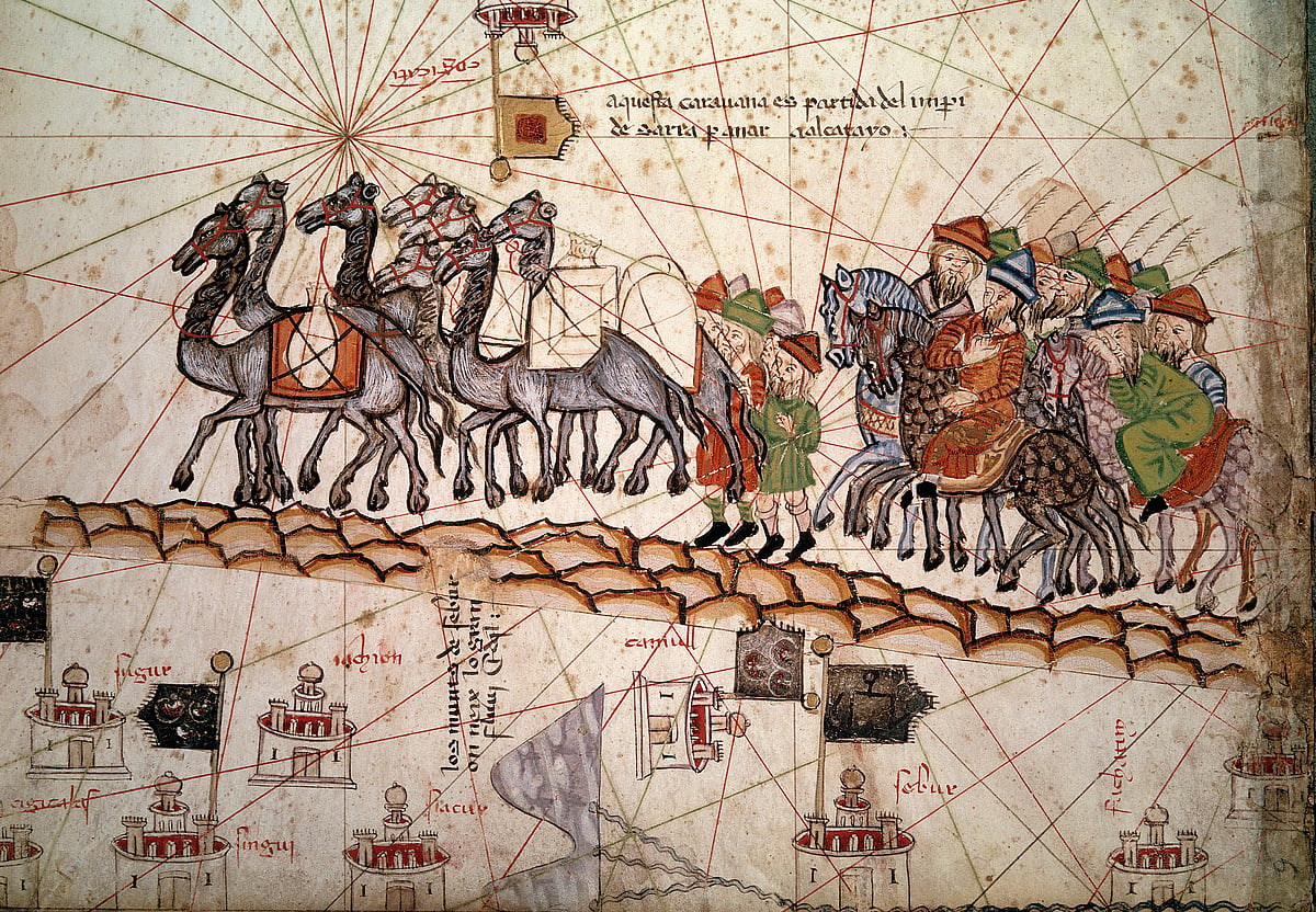 Detail of a Catalan nautical map (portulan) representing the Asia of the 13th century with a caravan on the way to Cathay (name given to northern China by Marco Polo) : the silk road crossed by Marco Polo. Catalan Atlas by Abraham Cresques (1325-1387), illuminated manuscript on parchment, Majorca (Mallorca, Mallorque), 1375. BN, Paris, France (Photo by Leemage/Corbis via Getty Images)