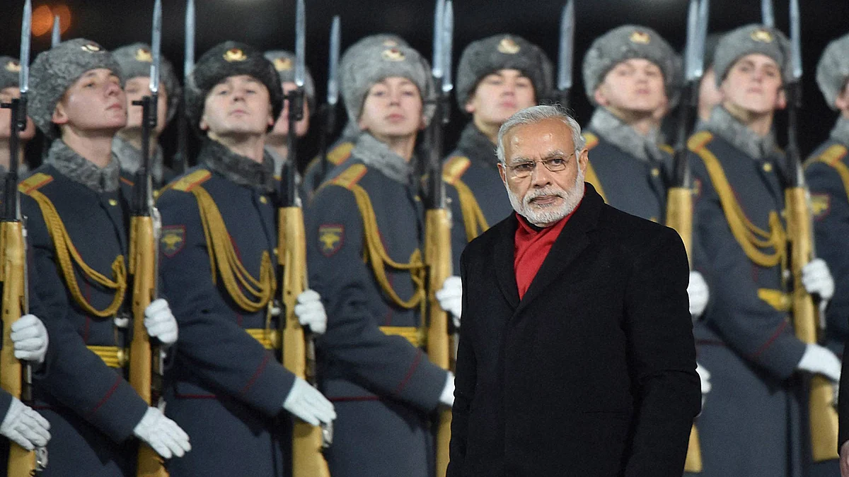 Prime Minister Narendra Modi inspecting the guard of honour on his arrival at the airport in Moscow. (Photo: PTI)