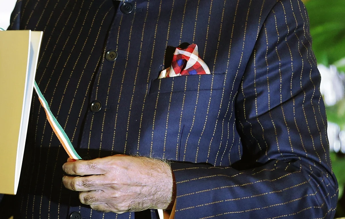 A close-up view of Indian Prime Minister Narendra Modi’s dark pinstripe suit. (Photo: Reuters)