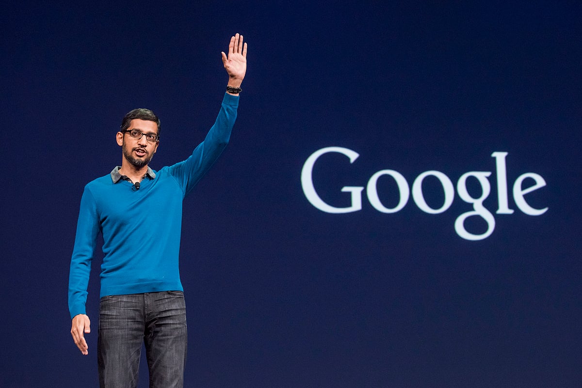 Sundar Pichai, head of Google gestures during I/O developers conference (Photographer: David Paul Morris/Bloomberg)