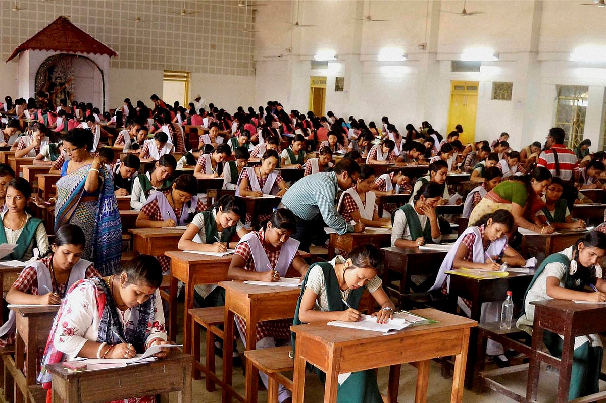  Students appear for exams in a school. (Source: PTI)