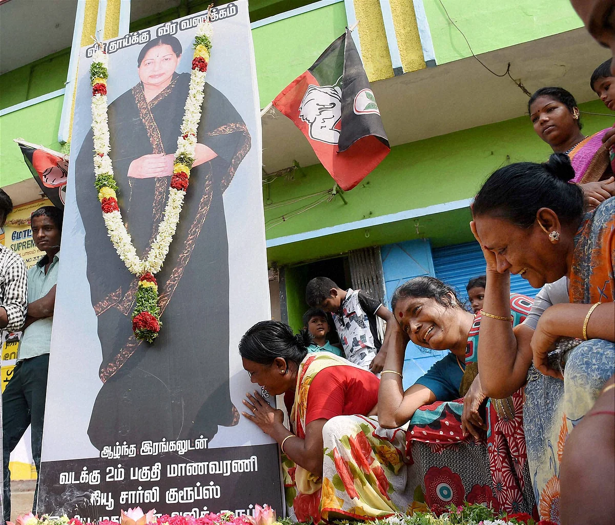 Supporters mourn the death of AIADMK leader J Jayalalithaa in Madurai on Tuesday (Source: PTI)