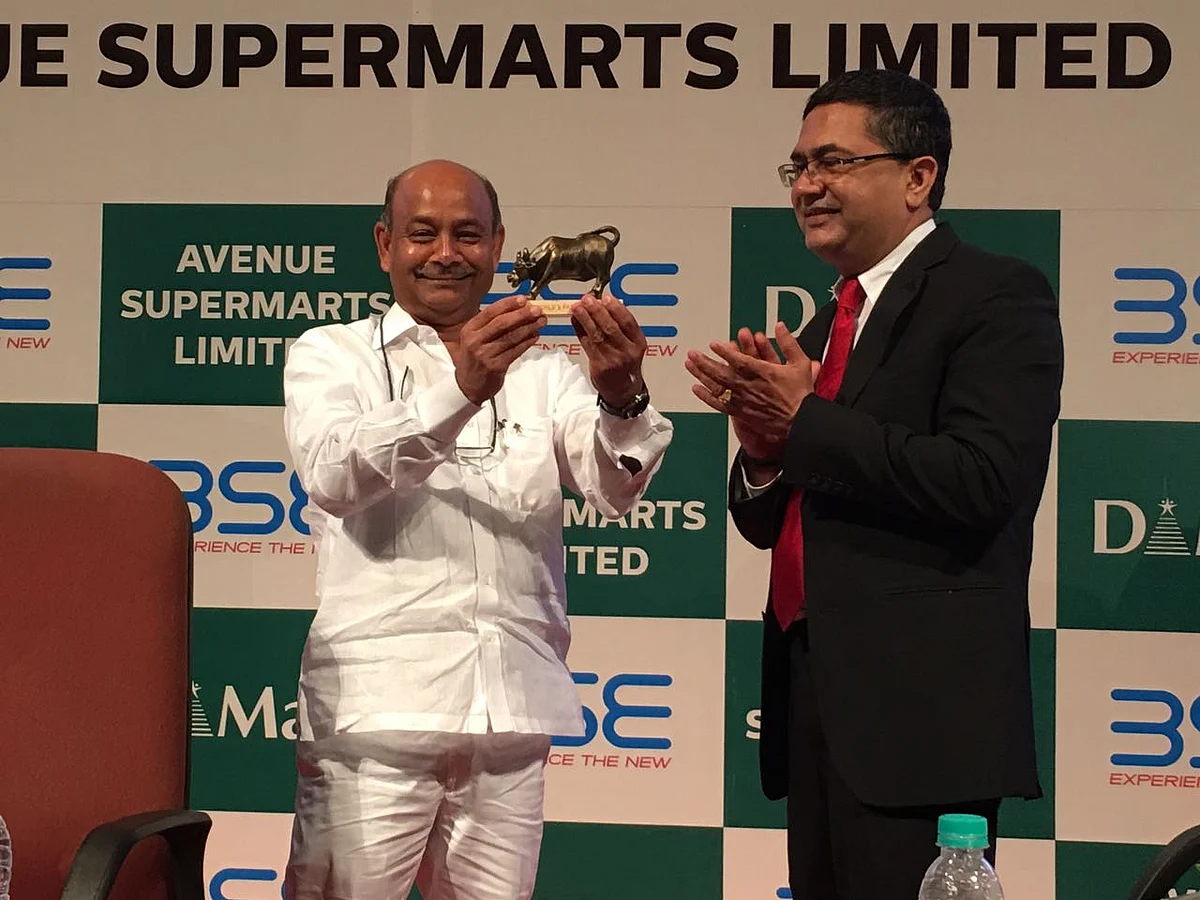 Radhakishan Damani with BSE Chief Executive Officer Ashishkumar Chauhan (right).(Photographer: Vijay Sartape/BloombergQuint)