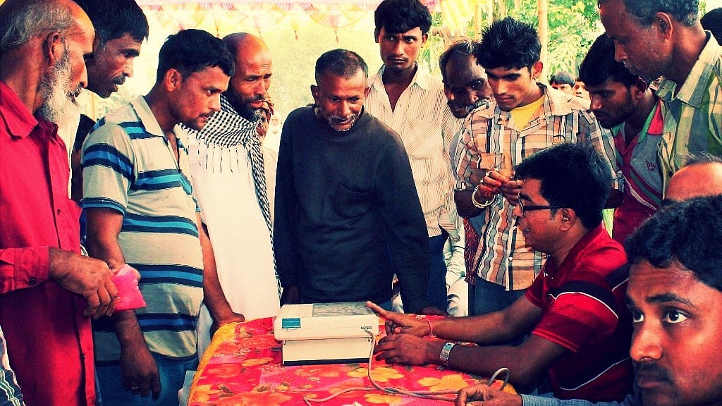 <div class="paragraphs"><p>  Election Commission officials demonstrating EVM usage. Photo used for representational purpose. (Photo: PTI)</p></div>