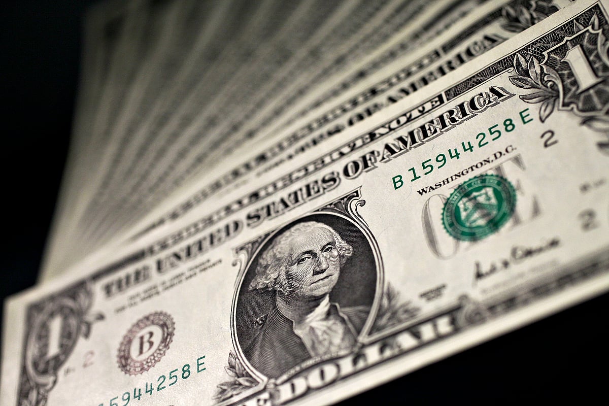 

U.S. one dollar bills are arranged for a photograph in New York. (Photographer: Daniel Acker/Bloomberg News)