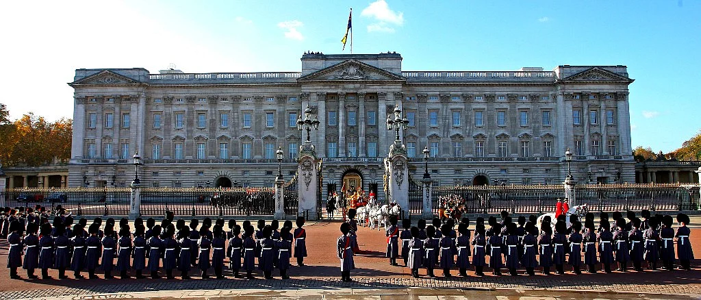 File photo of Queen Elizabeth II’s stage coach leaving the Buckingham Palace for the speech in 2007. (Photographer: Chris Ratcliffe/Bloomberg News) 