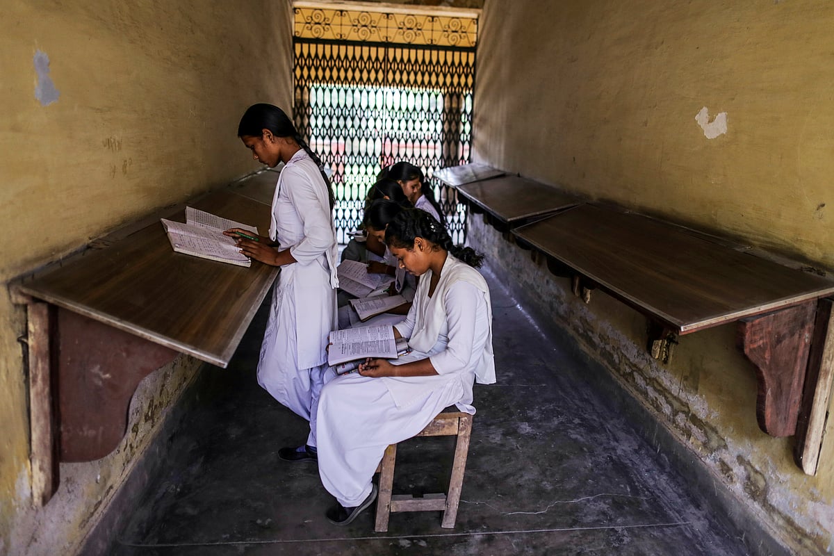 Students study at a college in Mughalsarai, Uttar Pradesh. (Photographer: Dhiraj Singh/Bloomberg)