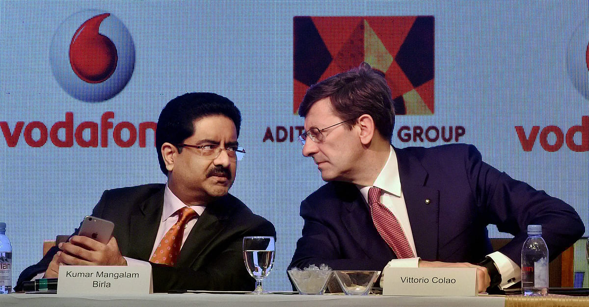 Aditya Birla Group Chairman Kumar Mangalam Birla and Voafone Plc CEO Vittaro Colao announce merger talks, in Mumbai on March 20, 2017. (Photograph: PTI)