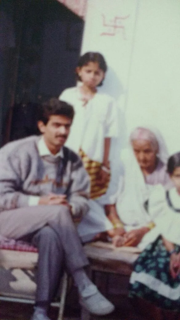 A photo of the author with his grandmother.