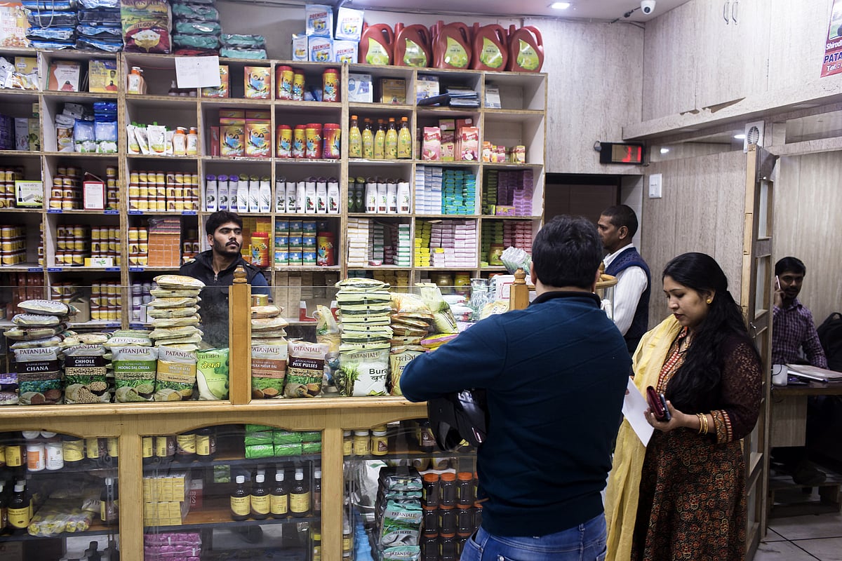 Customers browse at a Patanjali Ayurved Ltd. store in New Delhi, India. (Photographer: Udit Kulshrestha/Bloomberg) &nbsp;