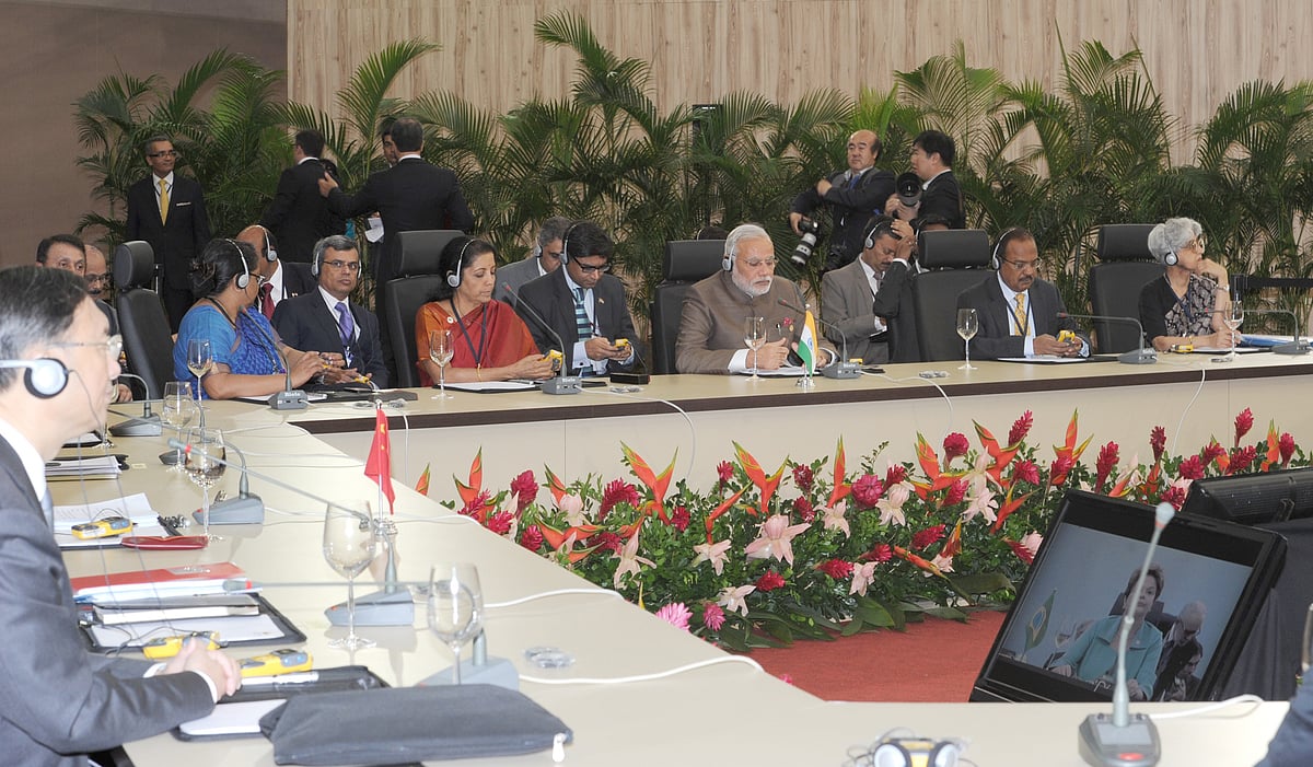 File photo of now Defence Minister Nirmala Sitharaman, Prime Minister Narendra Modi and National Security Advisor Ajit Doval meeting Chinese delegates at the Sixth BRICS Summit, in Brazil on July 15, 2014. (Photograph: PIB)<a href="http://pibphoto.nic.in/photo//2014/Jul/l2014071555168.jpg"><i><br></i></a>