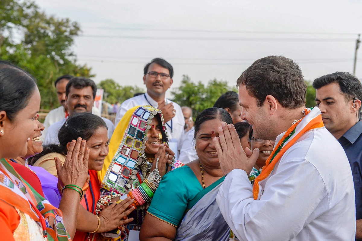 Congress President Rahul Gandhi meets his supporters during an election campaign ahead of Karnataka Assembly elections at Gajendragarh in Gadag district on Friday. (Source: PTI)