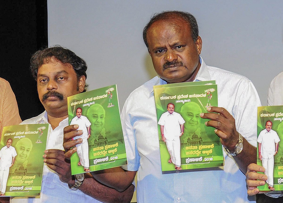Janata Dal (Secular) President HD Kumaraswamy with party leaders release a party manifesto ahead of Karnataka Assembly Elections. (Photograph: PTI)