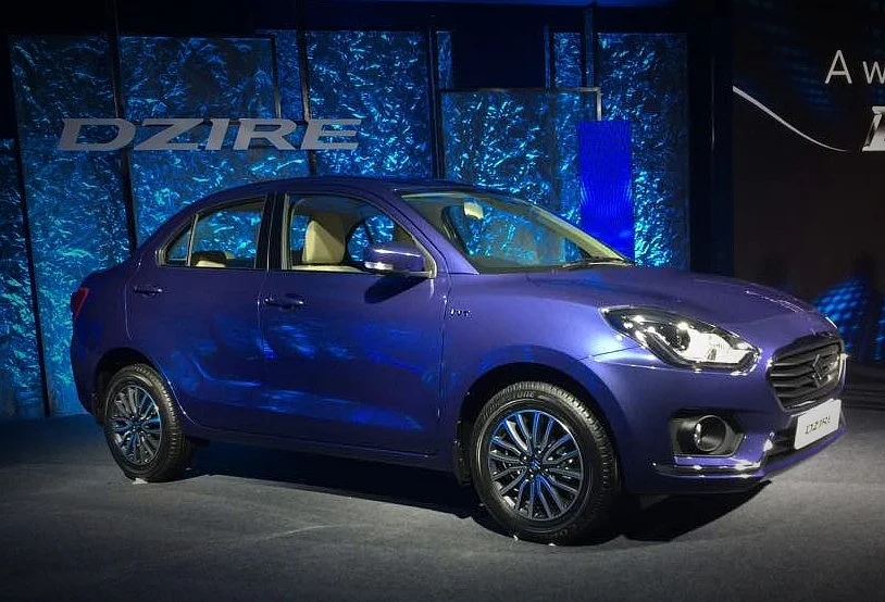 The new Dzire unveiled at the launch in New Delhi. (Photographer: Rajinder Kumar/Bloomberg)