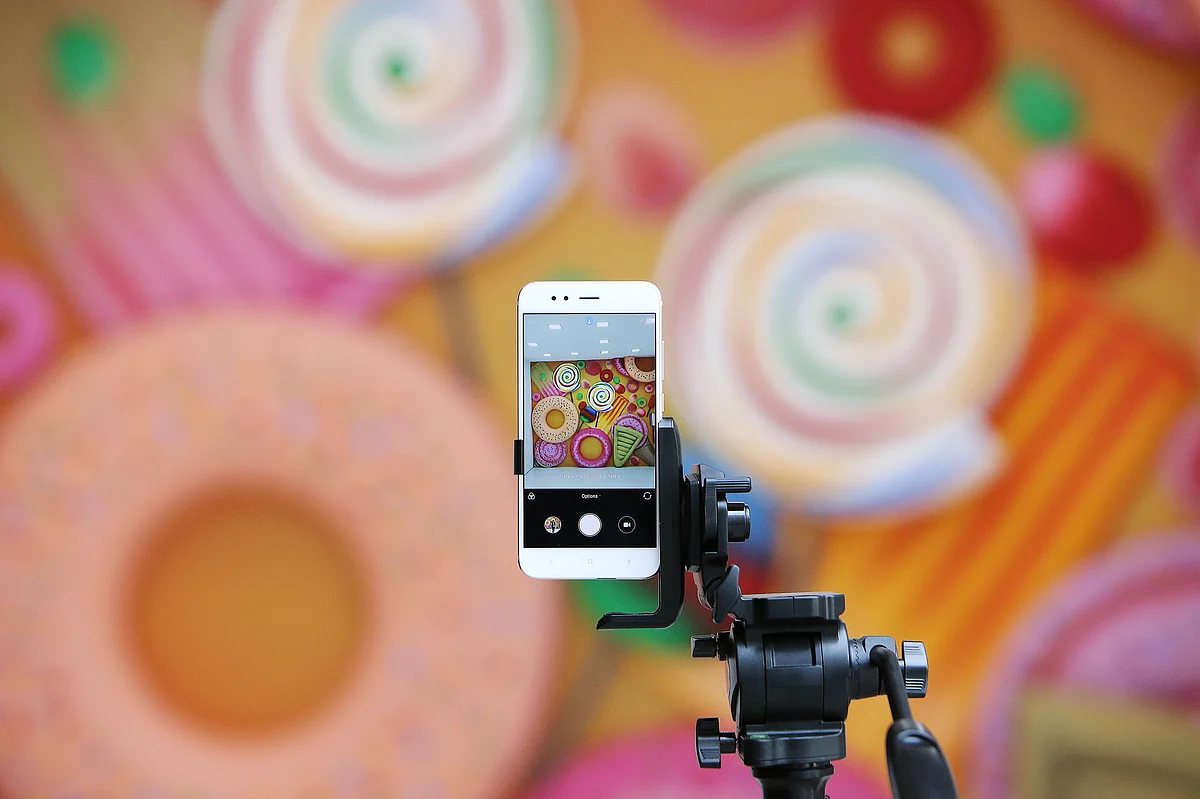 A Xiaomi Corp. Mi A1 dual camera device is attached to a tripod ready to take a photograph during the smartphone’s launch in New Delhi, India, on Sept. 5, 2017. (Photographer: Anindito Mukherjee/Bloomberg)