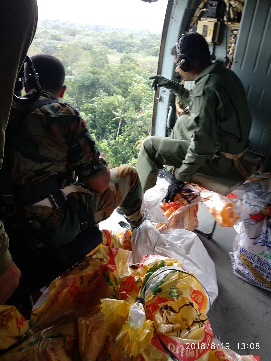 The Indian Air Force officers deployed for the rescue mission in Kerala take account of the situation.