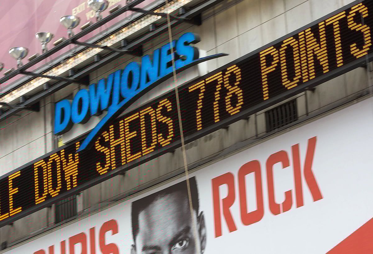 The Dow Jones ticker in Times Square as U.S. stocks plunged the most since the 1987 crash, in New York, on Sept. 29, 2008. (Photographer: Jin Lee/Bloomberg News)